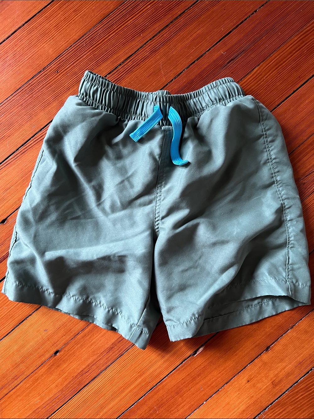 Primary Olive Green Swim Trunks with Bright Blue Drawstring